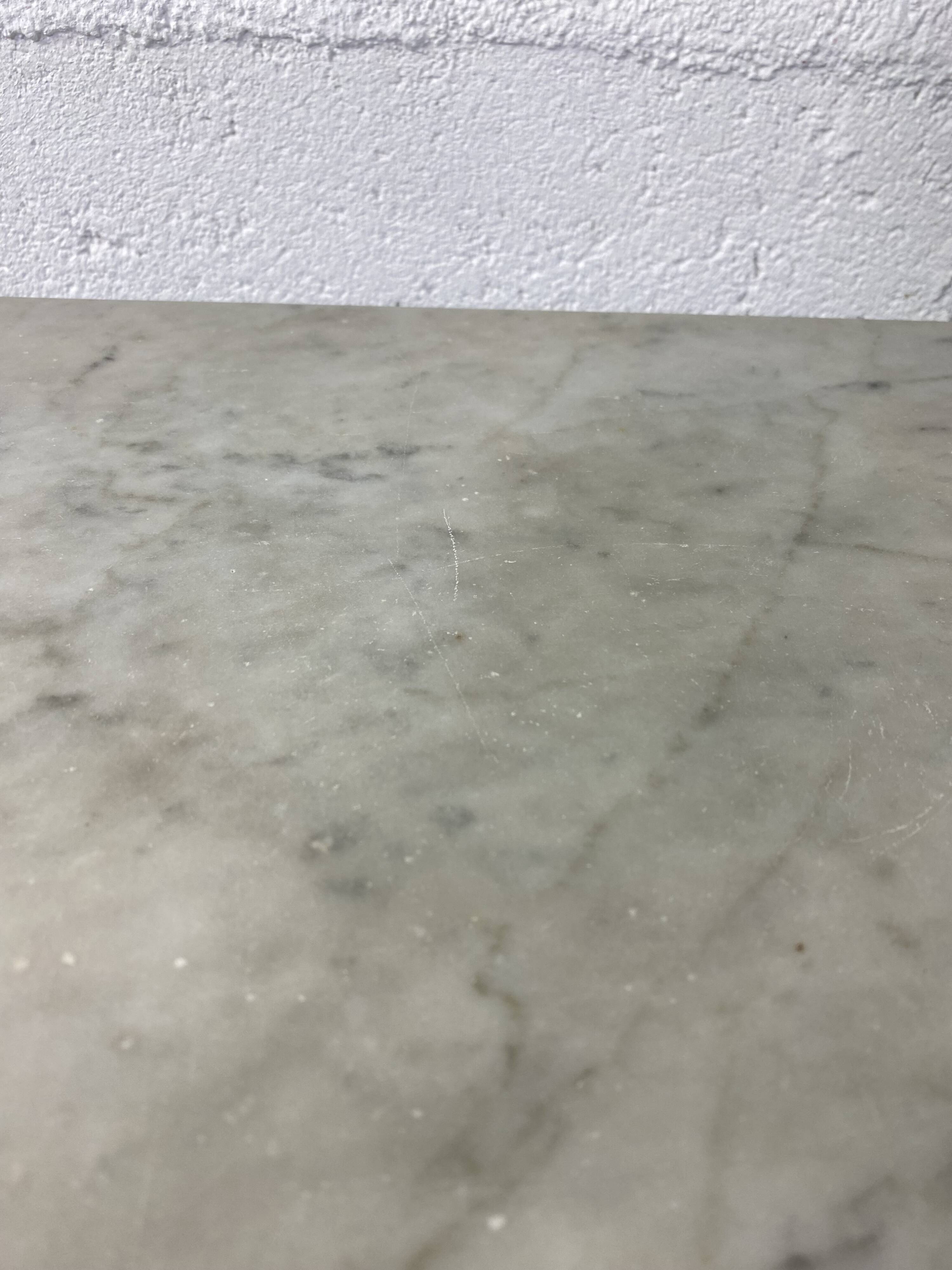Set of two bistro tables in marble and wrought iron