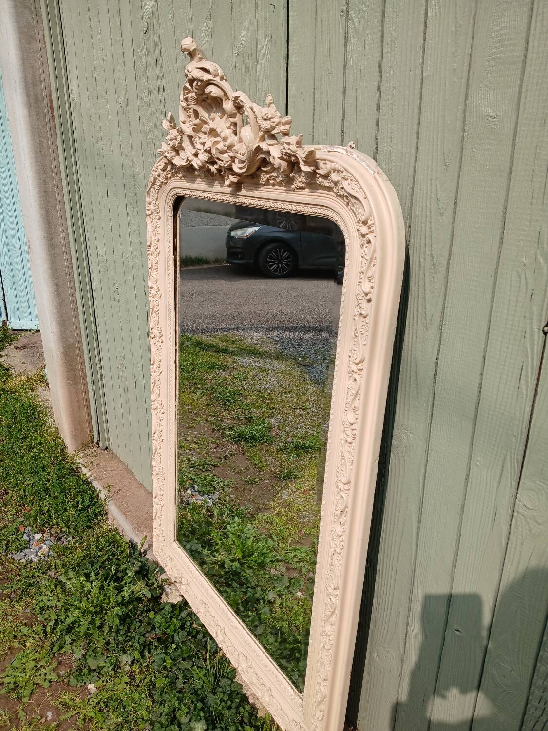 Antique carved wooden mirror