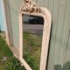 Antique carved wooden mirror