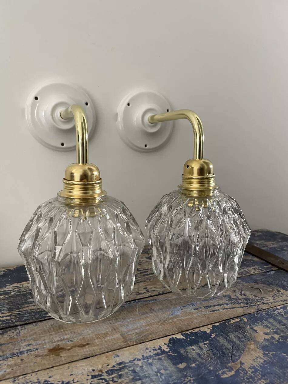 Pair of chiseled glass wall sconces