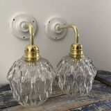 Pair of chiseled glass wall sconces