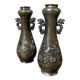 Pair of bronze vases - Asian motifs in relief in copper