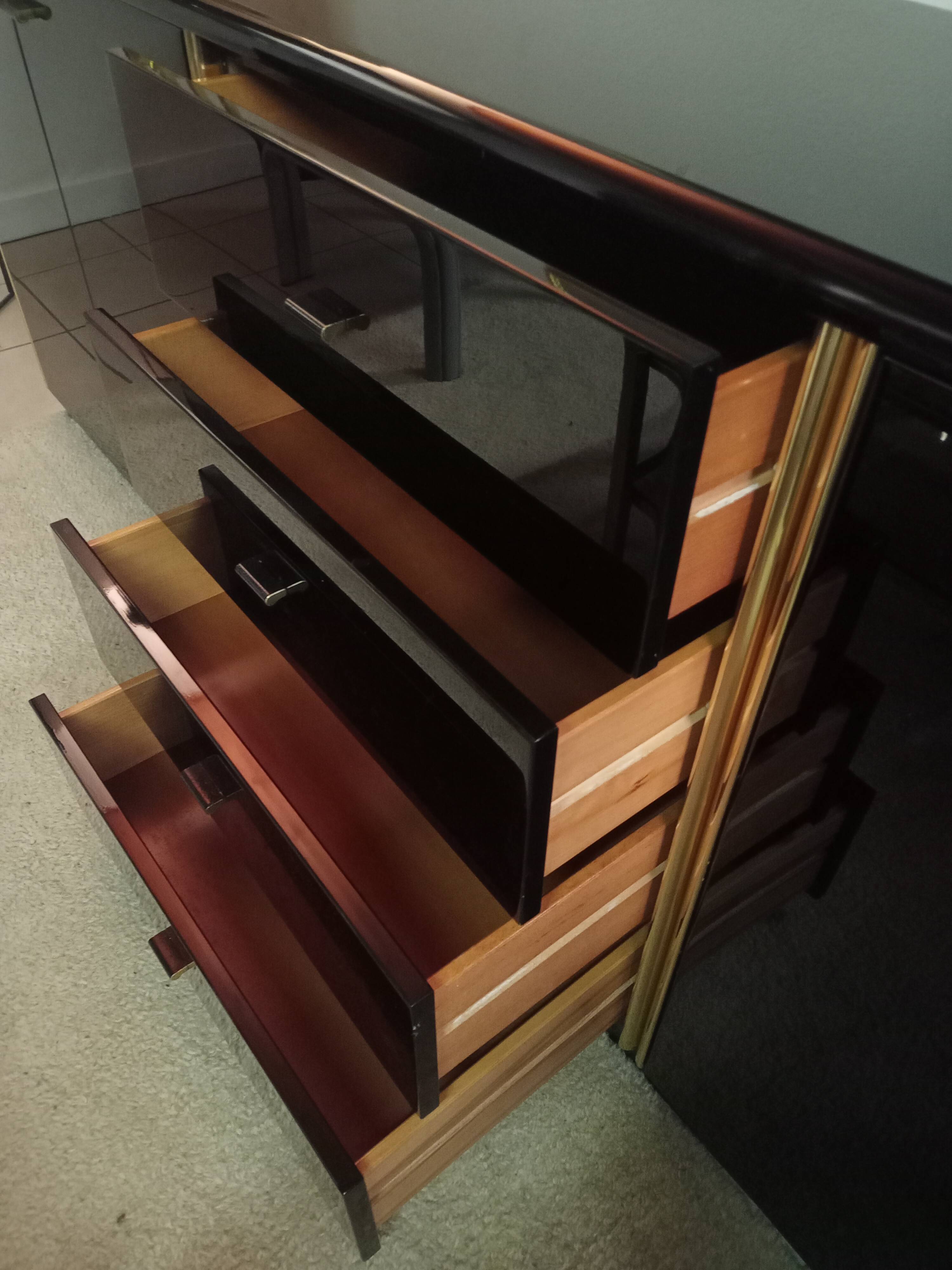 Black lacquered and brass design 70/80