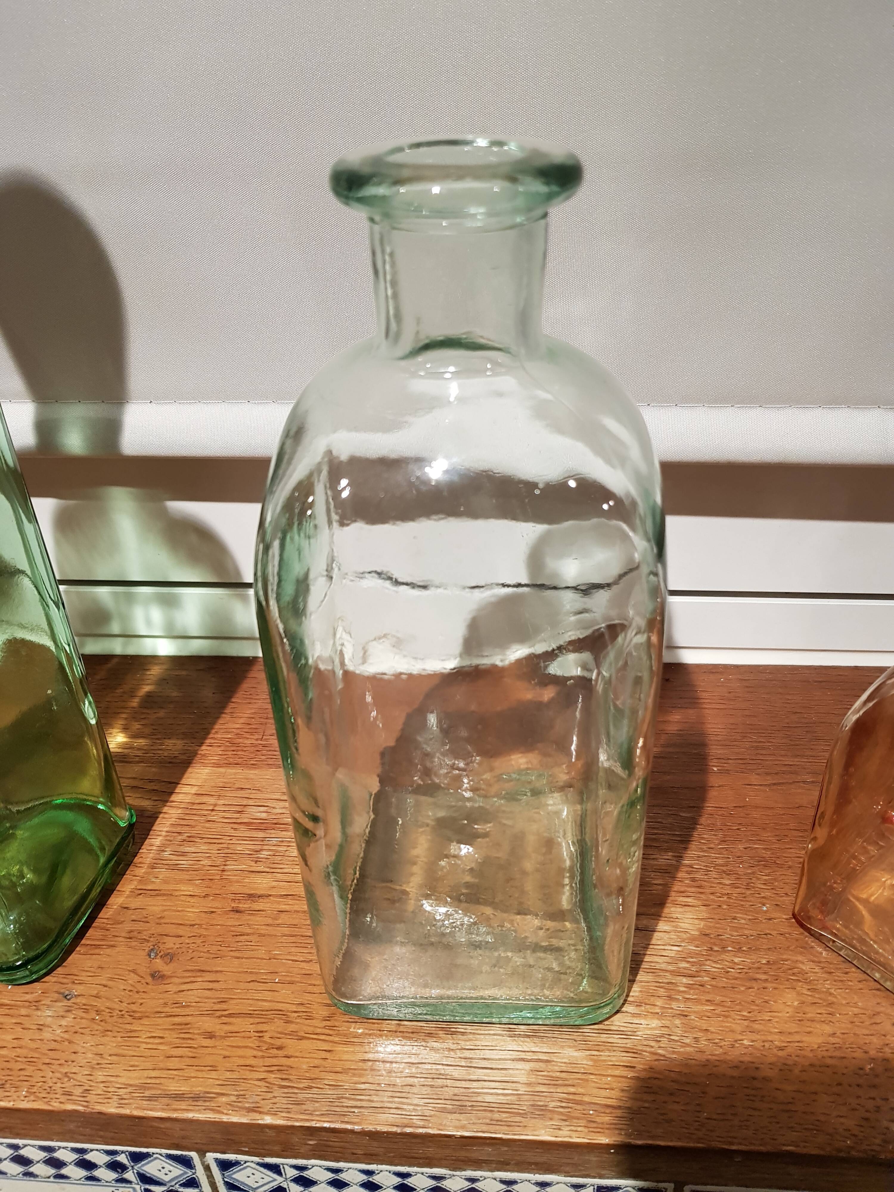 Light green glass apothecary bottle