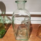 Light green glass apothecary bottle