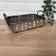 Woven silver-plated metal basket.