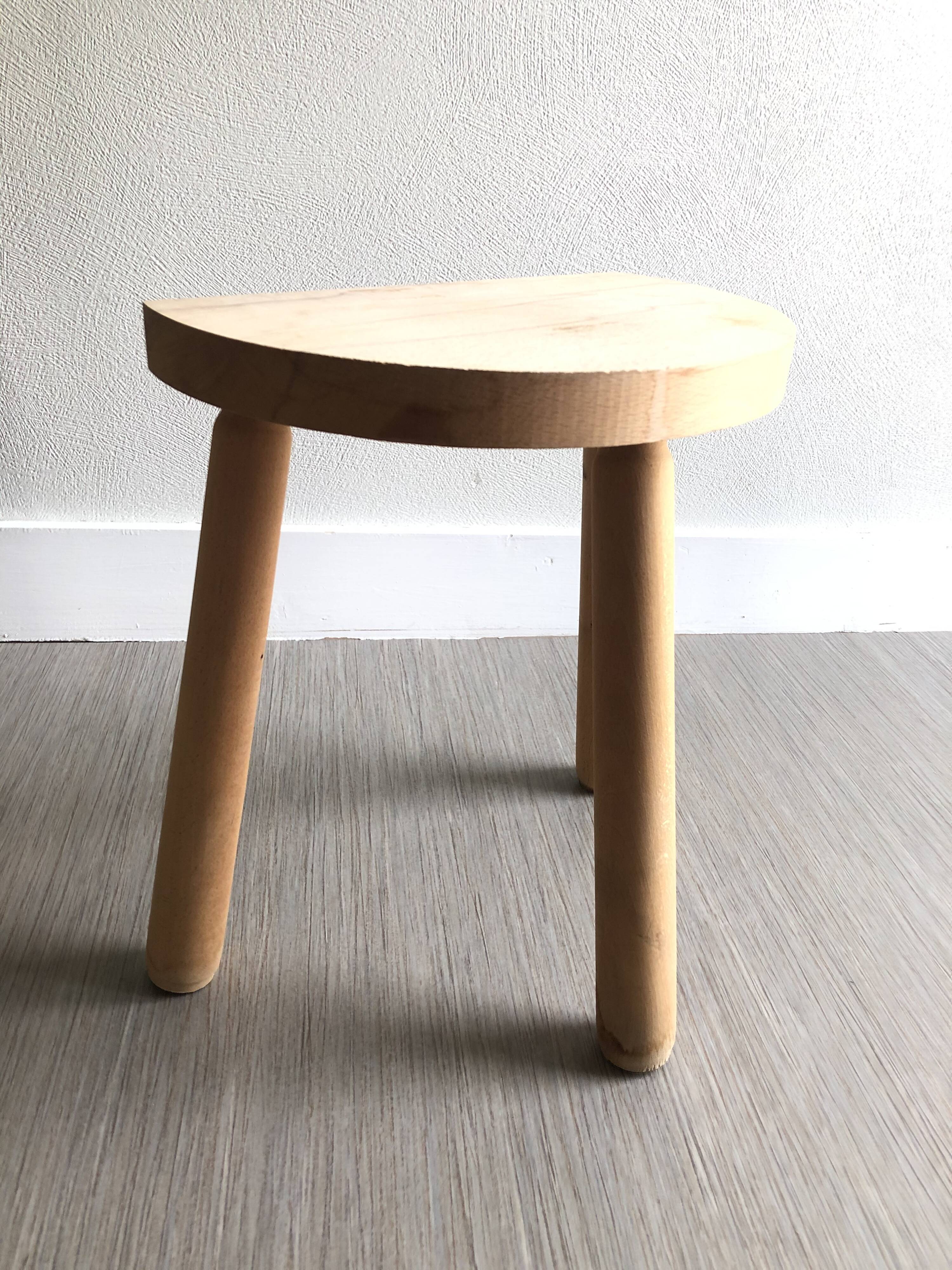Wooden tripod stool