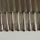 Set of 12 Christofle Cluny Vieux Paris brasserie knives 1960