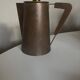 Modernist Italian pitcher design from the 1960s in patinated wood and metal.