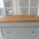 Louis Philippe style chest of drawers, 7 drawers, in verdigris, wooden top