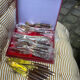Wood and brass fish service