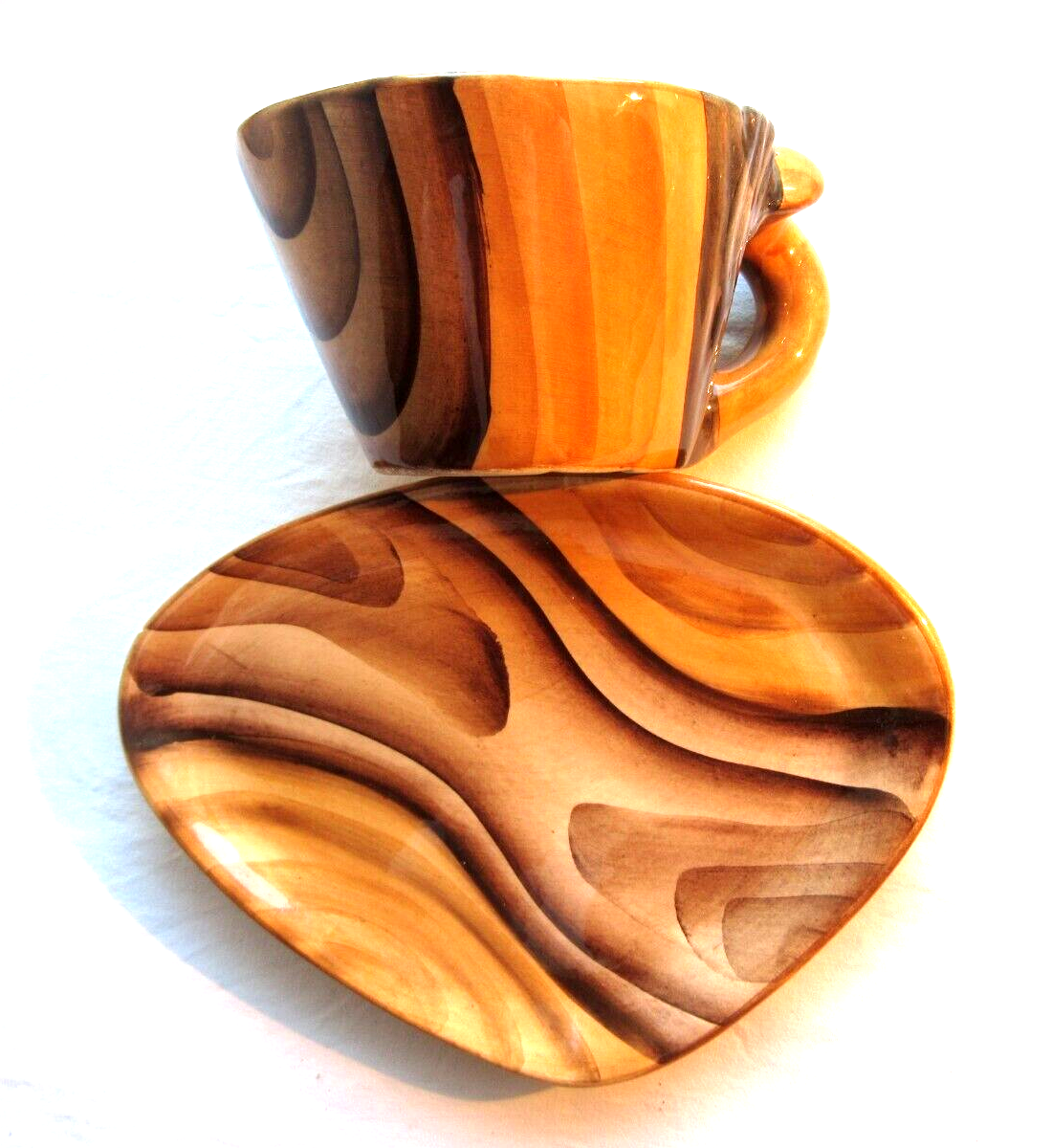 2 lunches decorated in faux wood style, cups + saucers, signed VALLAURIS