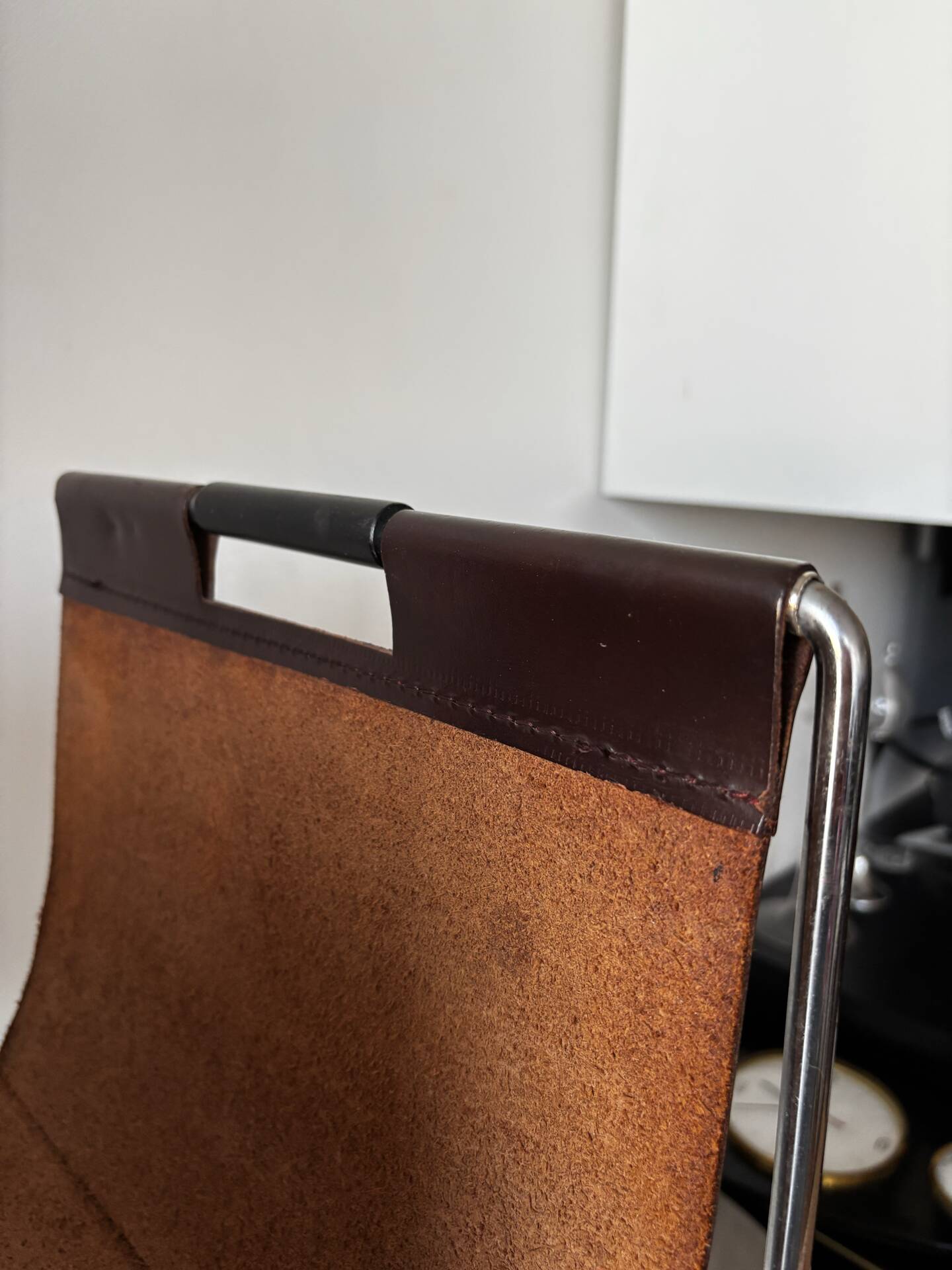 Leather and chrome magazine rack Brabantia