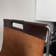 Leather and chrome magazine rack Brabantia