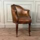 Louis XV style office chair in carved wood, brown leather, circa 1920.