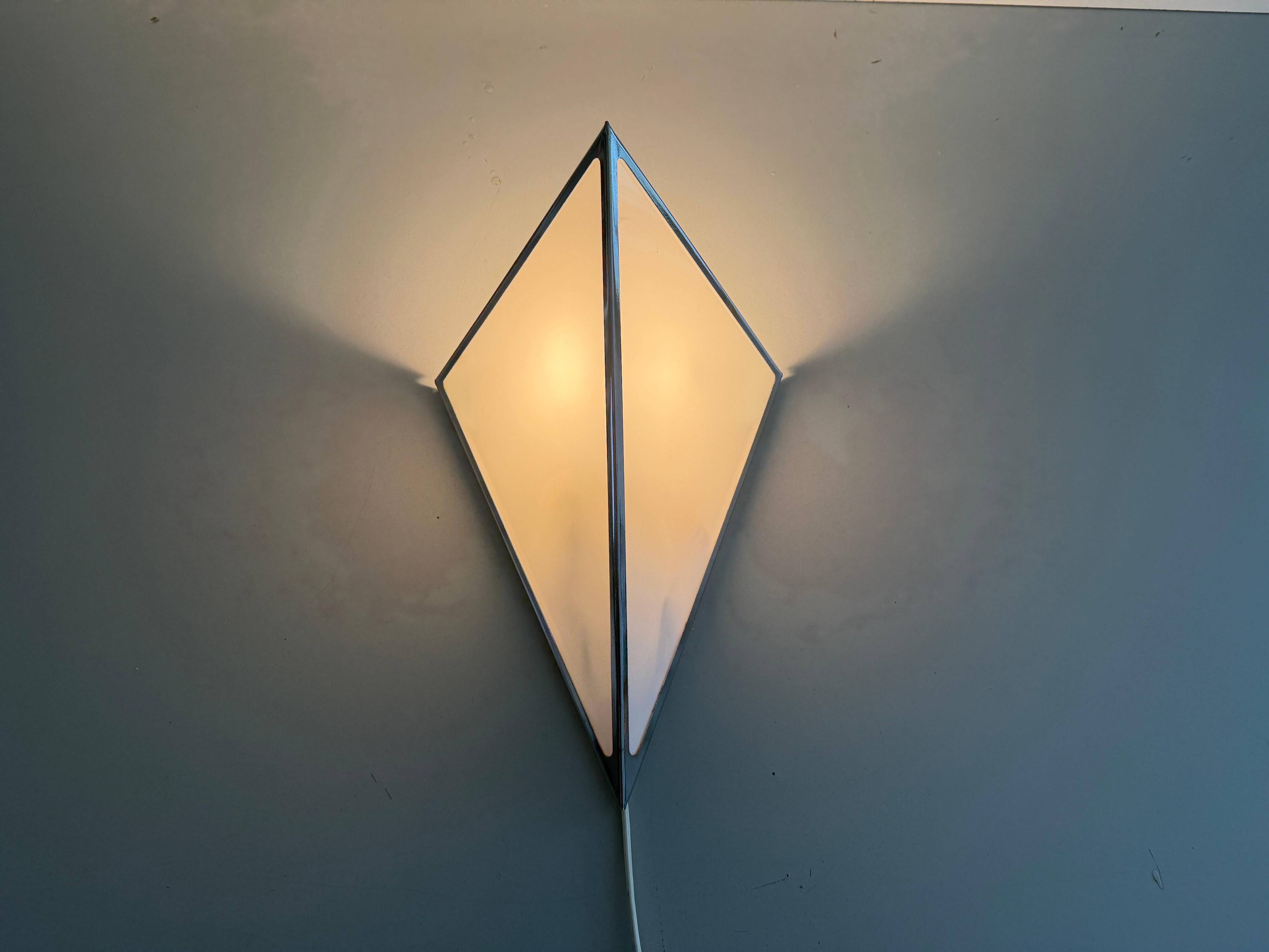 Simple opal glass wall light with an aluminium body, 1980s, Germany.