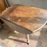 Round drop-leaf table