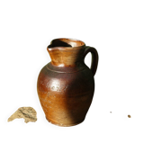 Large stoneware jug with a family name pattern, 1912