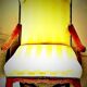 Wingback armchair in walnut in the French Regency style with stretcher in