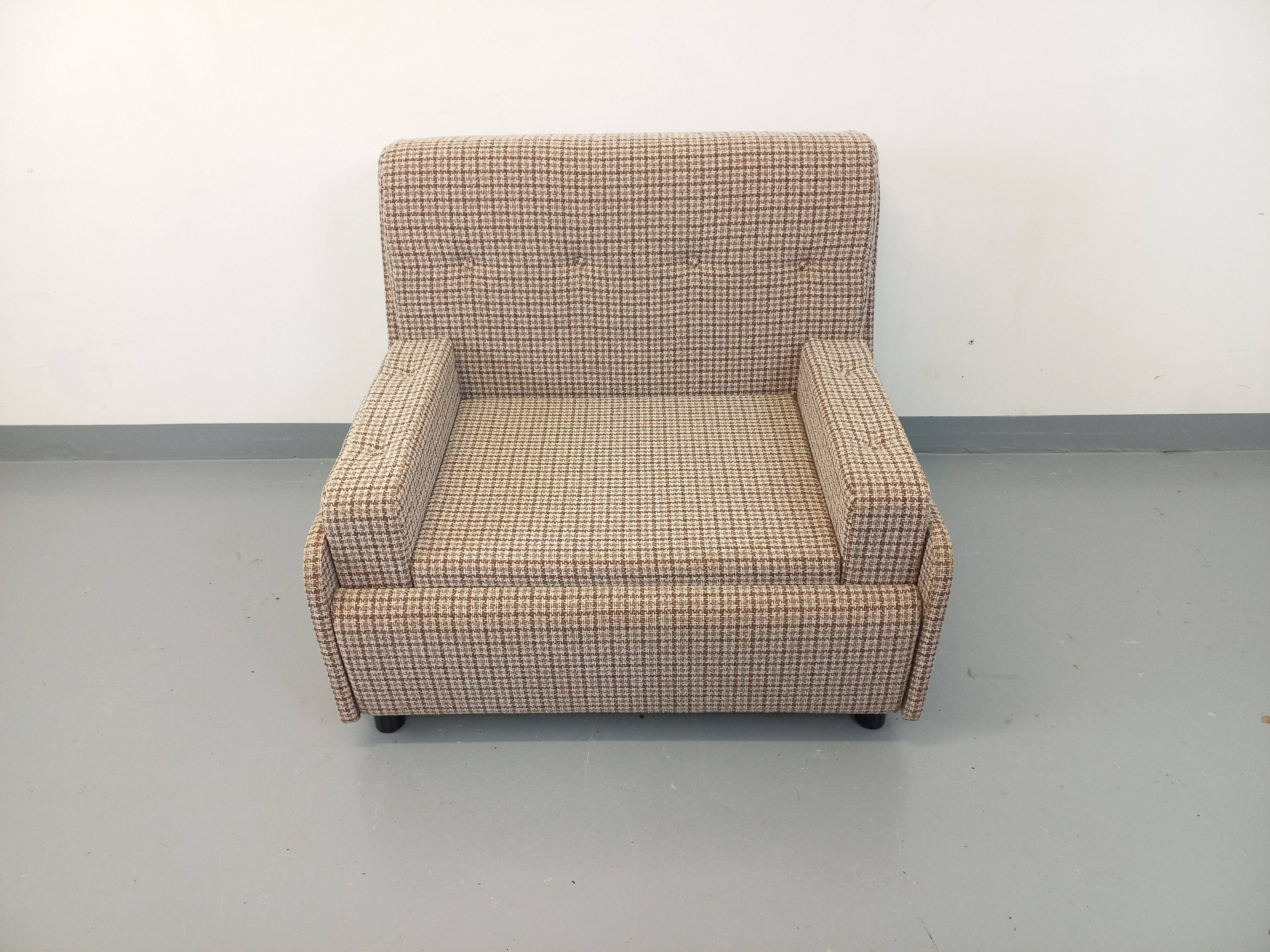 Vintage wool fabric armchair from the 1970s.