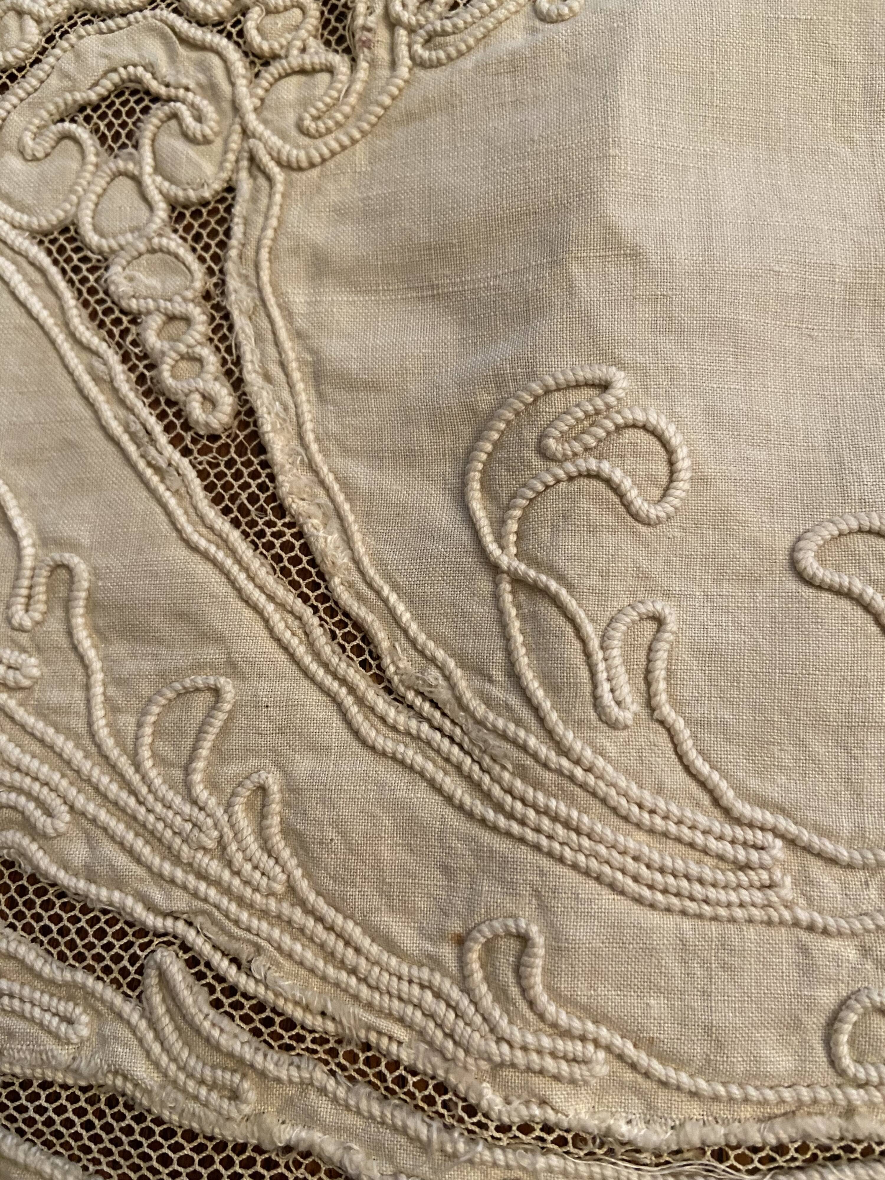 Sheet with embroidered decoration and openwork with cornucopia late nineteenth