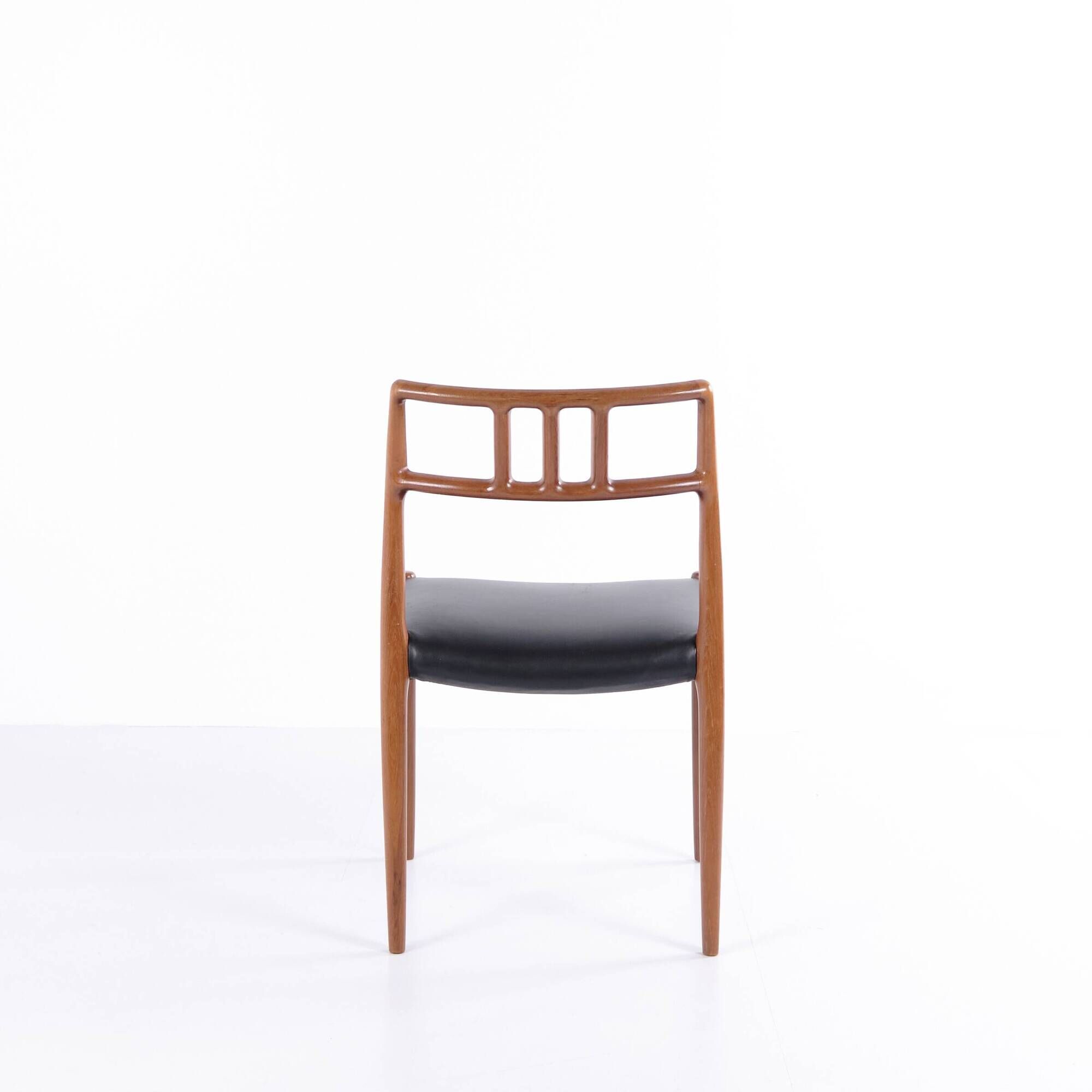 Dining chair – Niels Otto Møller – Model 79 – Teak & black leather – JL Møllers Møbelfabrik – 1960s