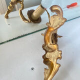 Louis XV bronze wall light with a flowing branch design and acanthus leaf decoration.