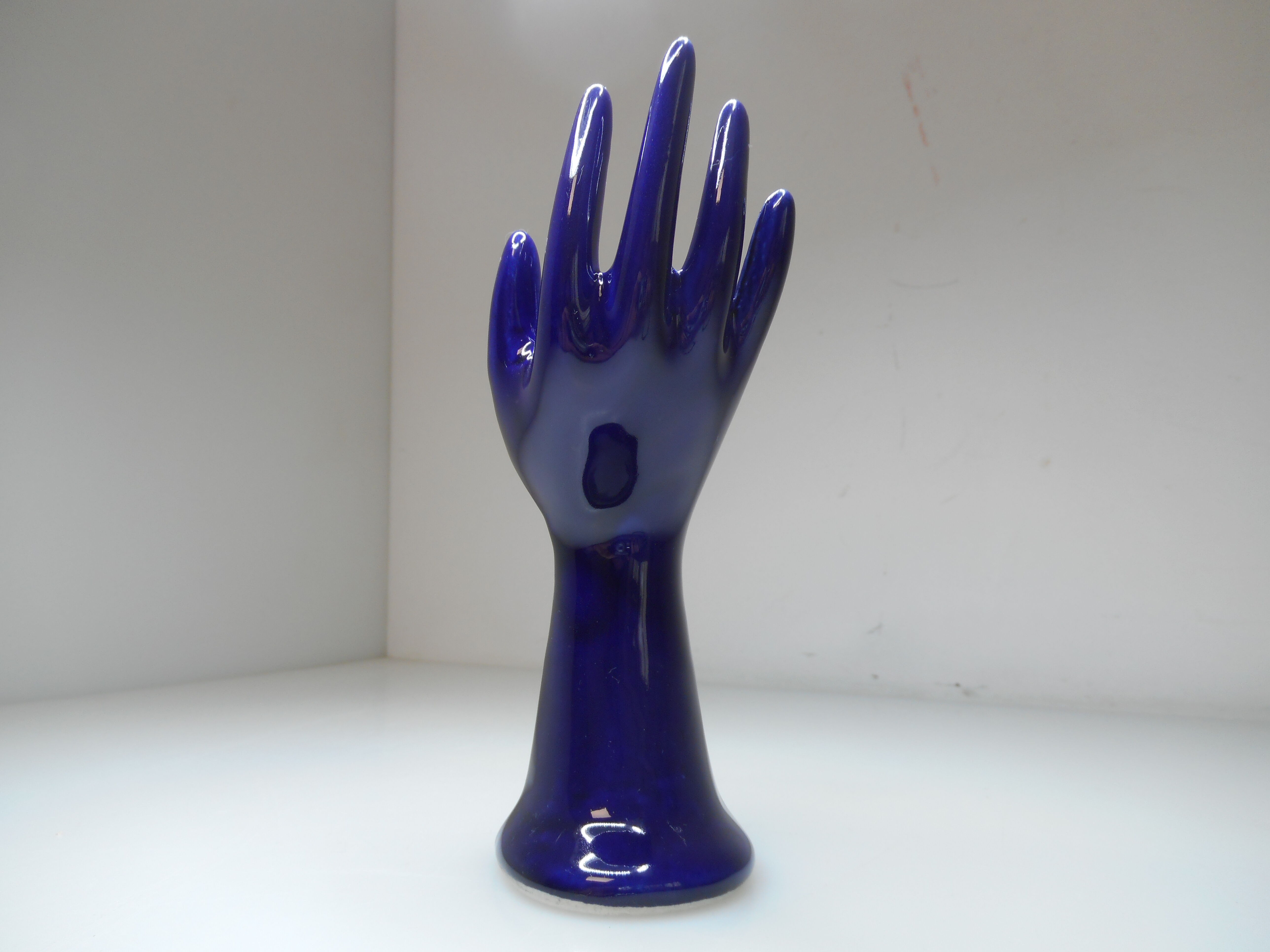 Vintage blue ceramic hand