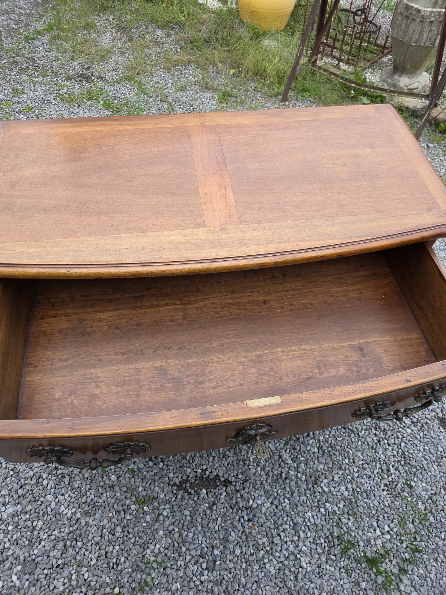 Curved Louis XV style chest of drawers in solid walnut