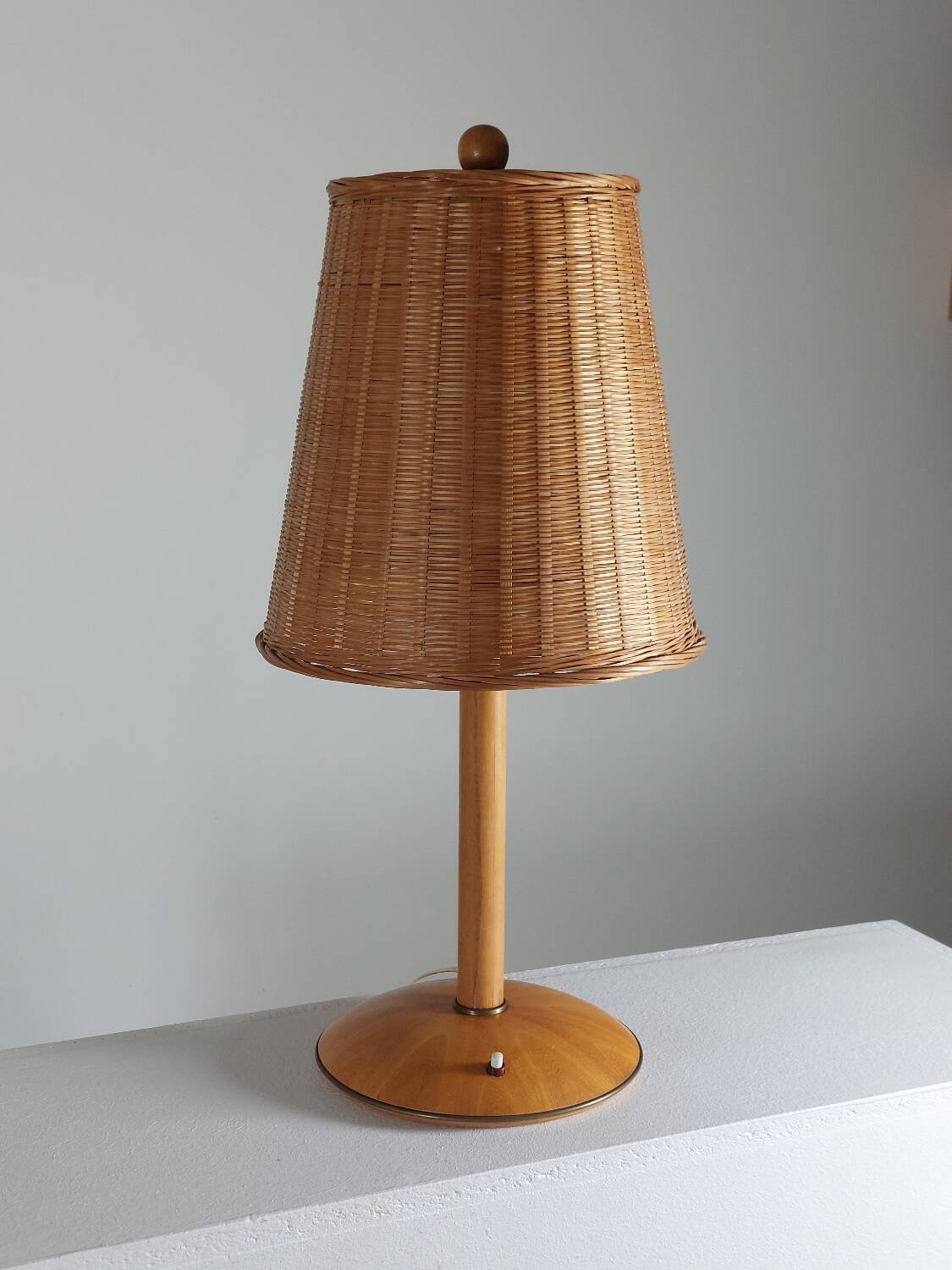 Vintage wooden and brass table lamp by Temde from the 1950s.