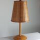 Vintage wooden and brass table lamp by Temde from the 1950s.
