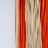 Orange and natural striped raffia wall light