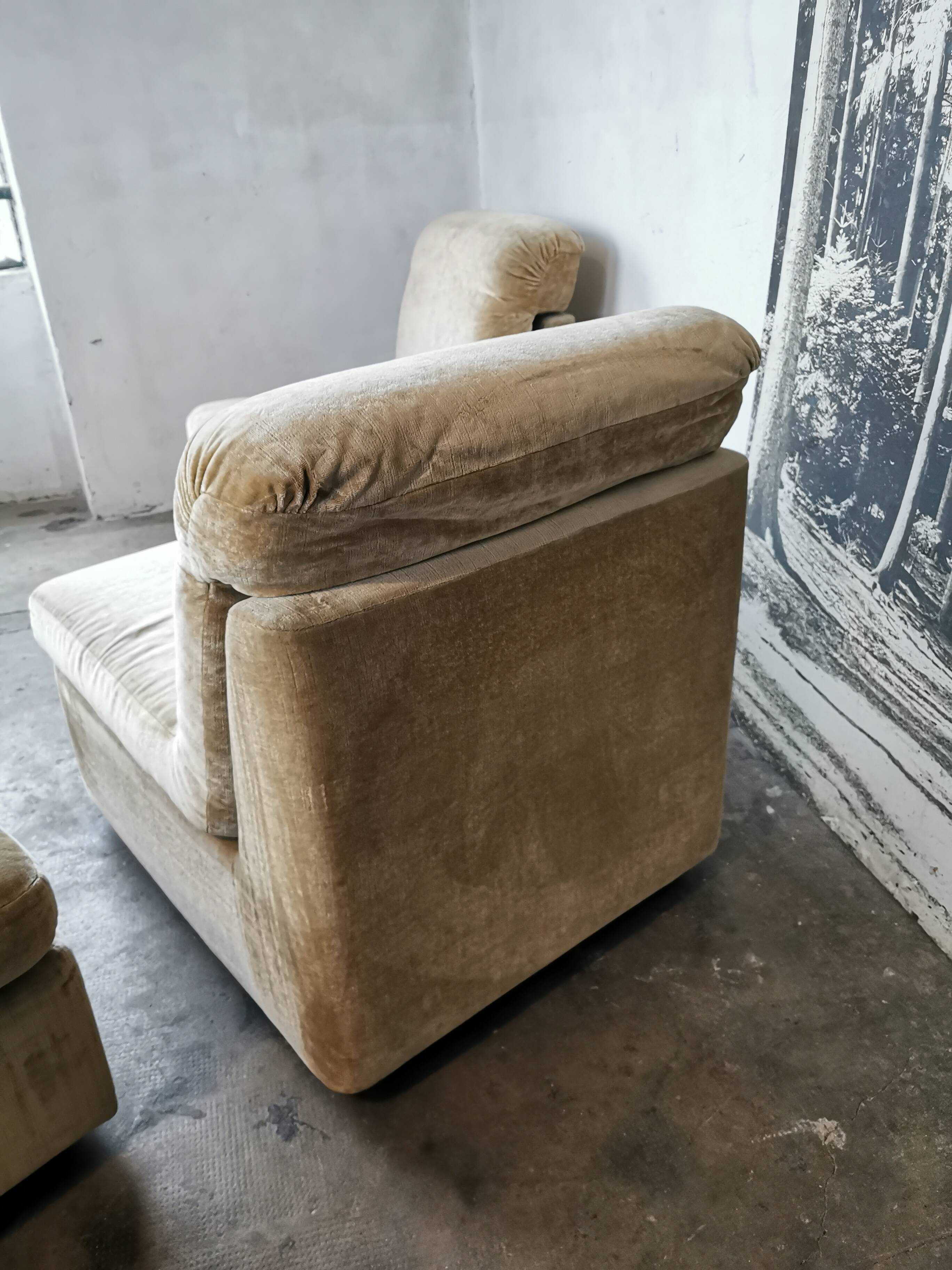 Pair of modular velvet armchairs and ottoman
