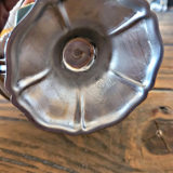 Stainless steel ice bowls by Guy Degrenne, low bowls in the shape of a flower.