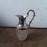 Old glass and silver metal wine carafe