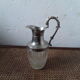 Old glass and silver metal wine carafe