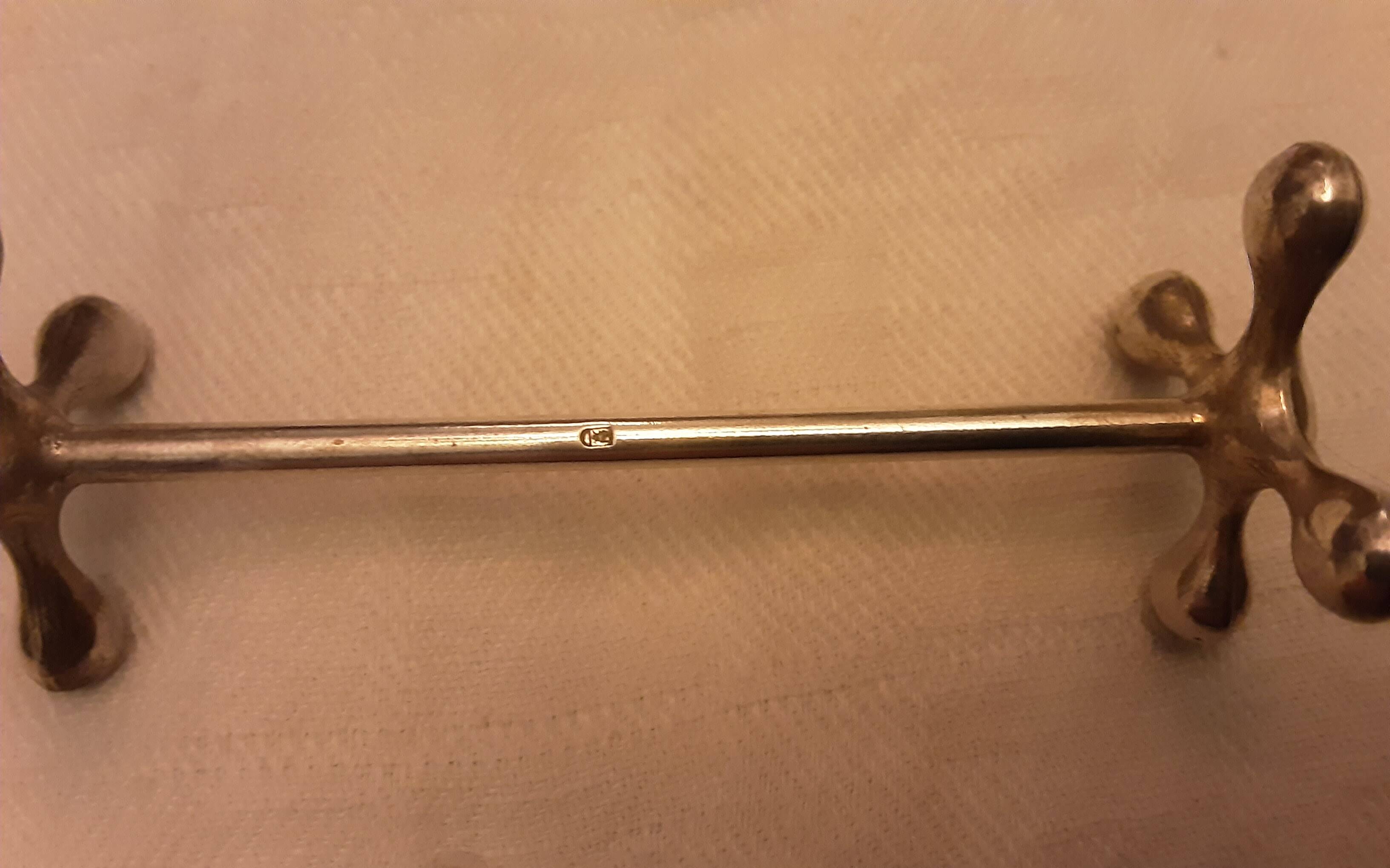 12 silver metal knife holders punched