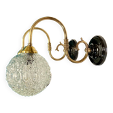 Pair of old swan neck wall lights in brass and transparent glass globe