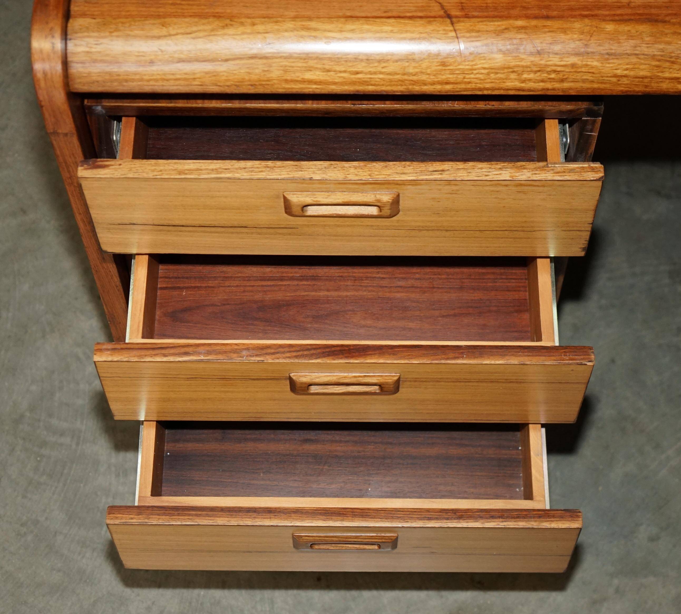 Mid-century modern right-angle desk in Brazilian wood.