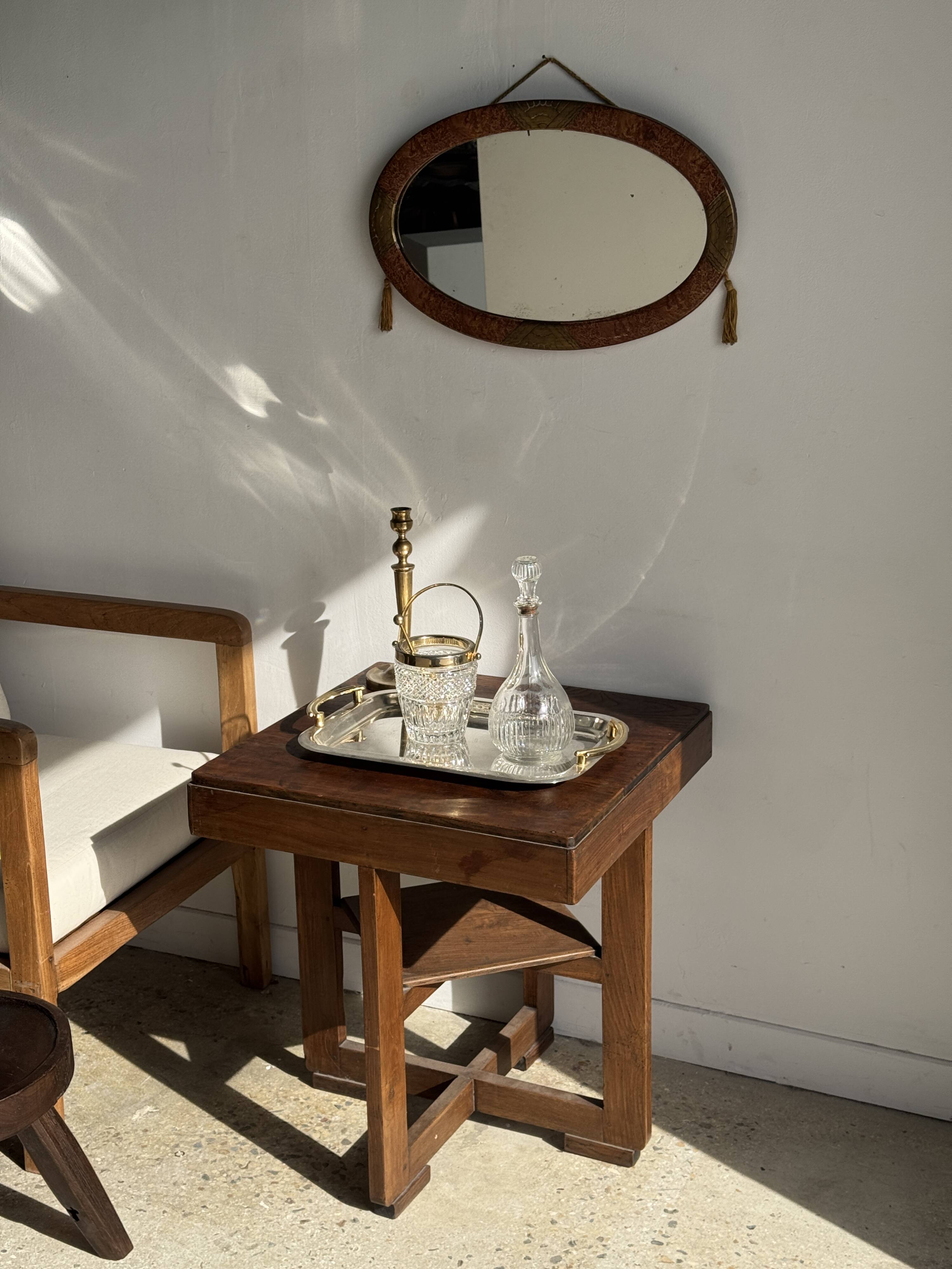 Small oval Art Deco mirror in brown and gold 33x54.