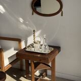 Small oval Art Deco mirror in brown and gold 33x54.