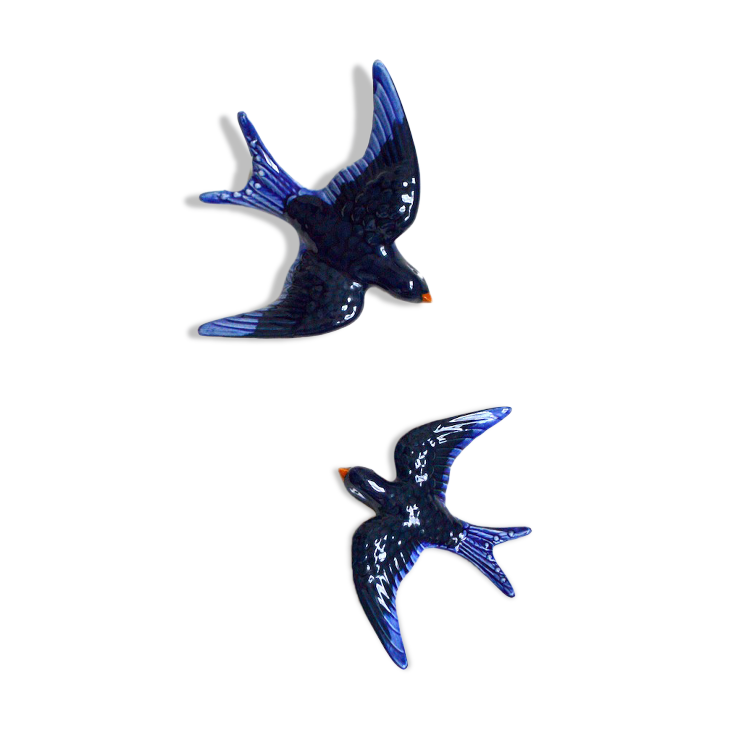 Couple of ceramic wall swallows