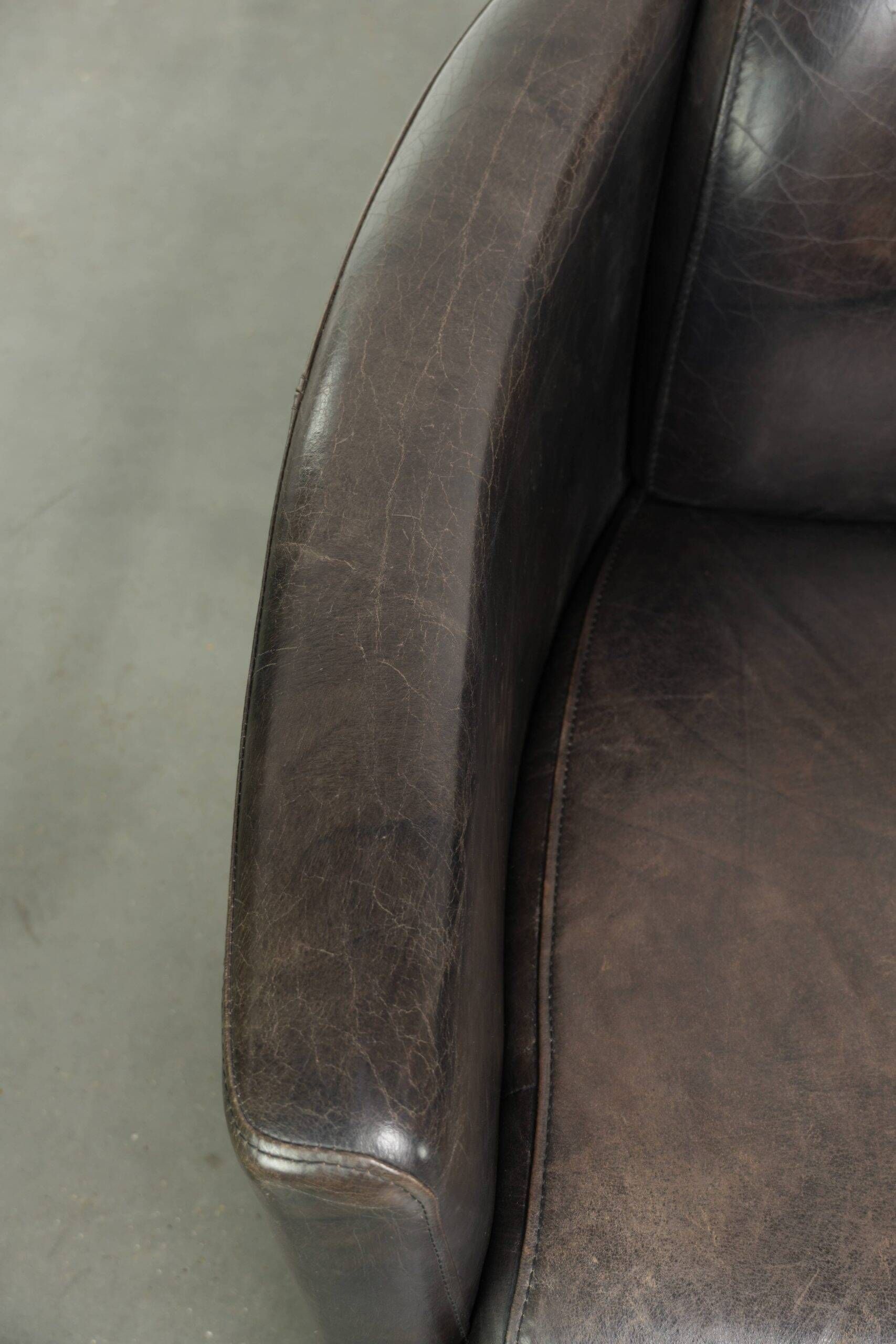 Ensemble vintage de 2 fauteuils en cuir de vachette au design Aviateur.