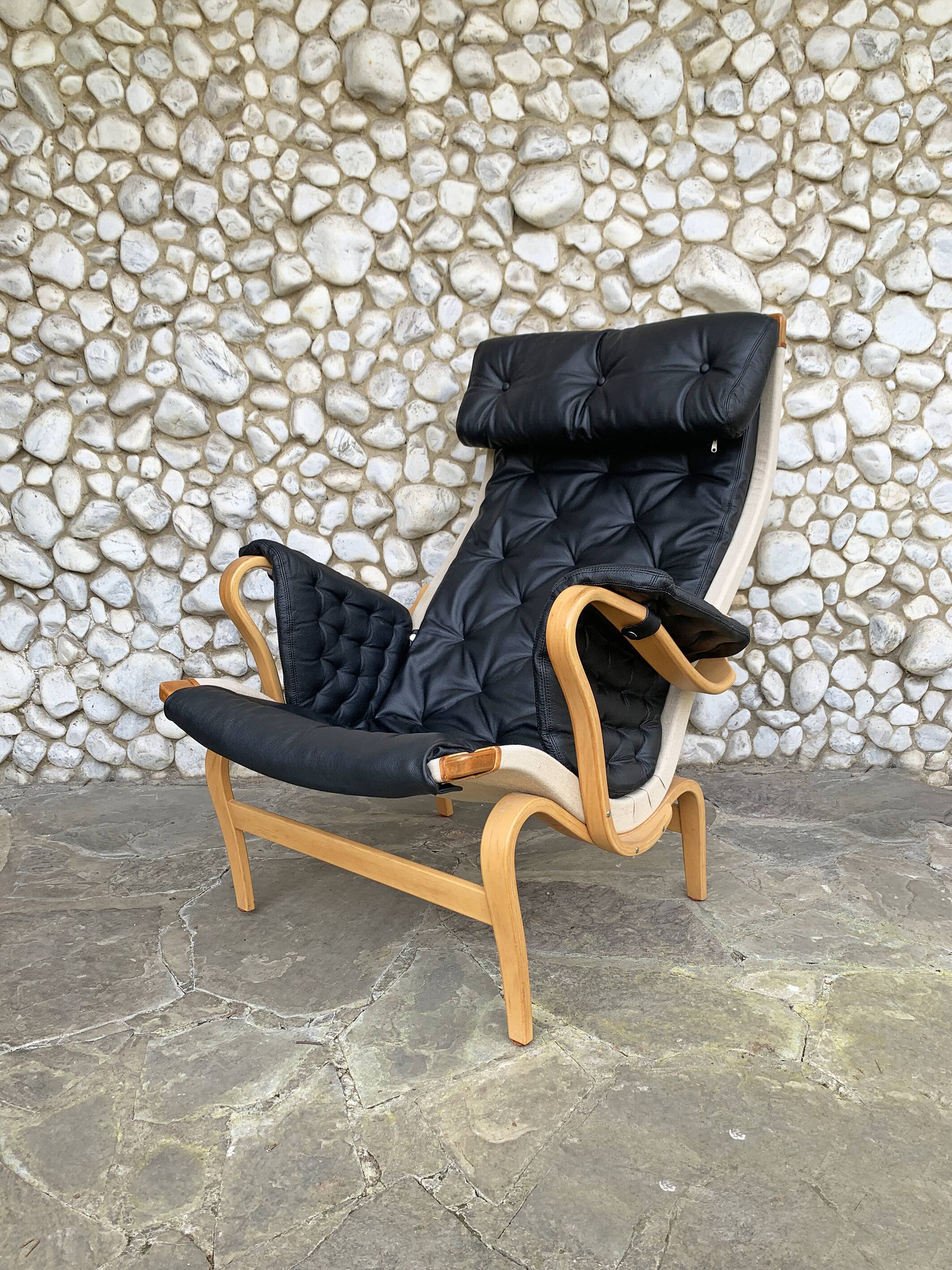 Pernilla armchair new black leather by Bruno Mathsson, Dux, Sweden 1970