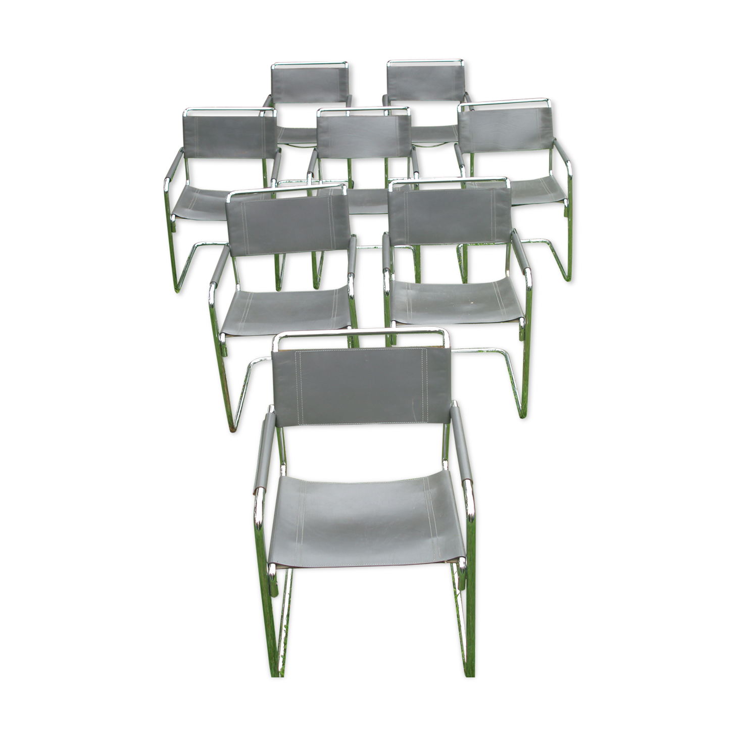 Series of grey and chrome leather armchairs