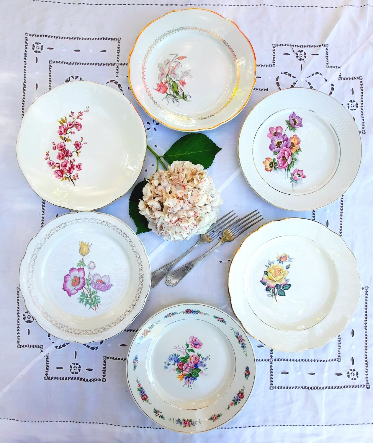 Old flat plates mismatched in earthenware