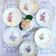 Old flat plates mismatched in earthenware