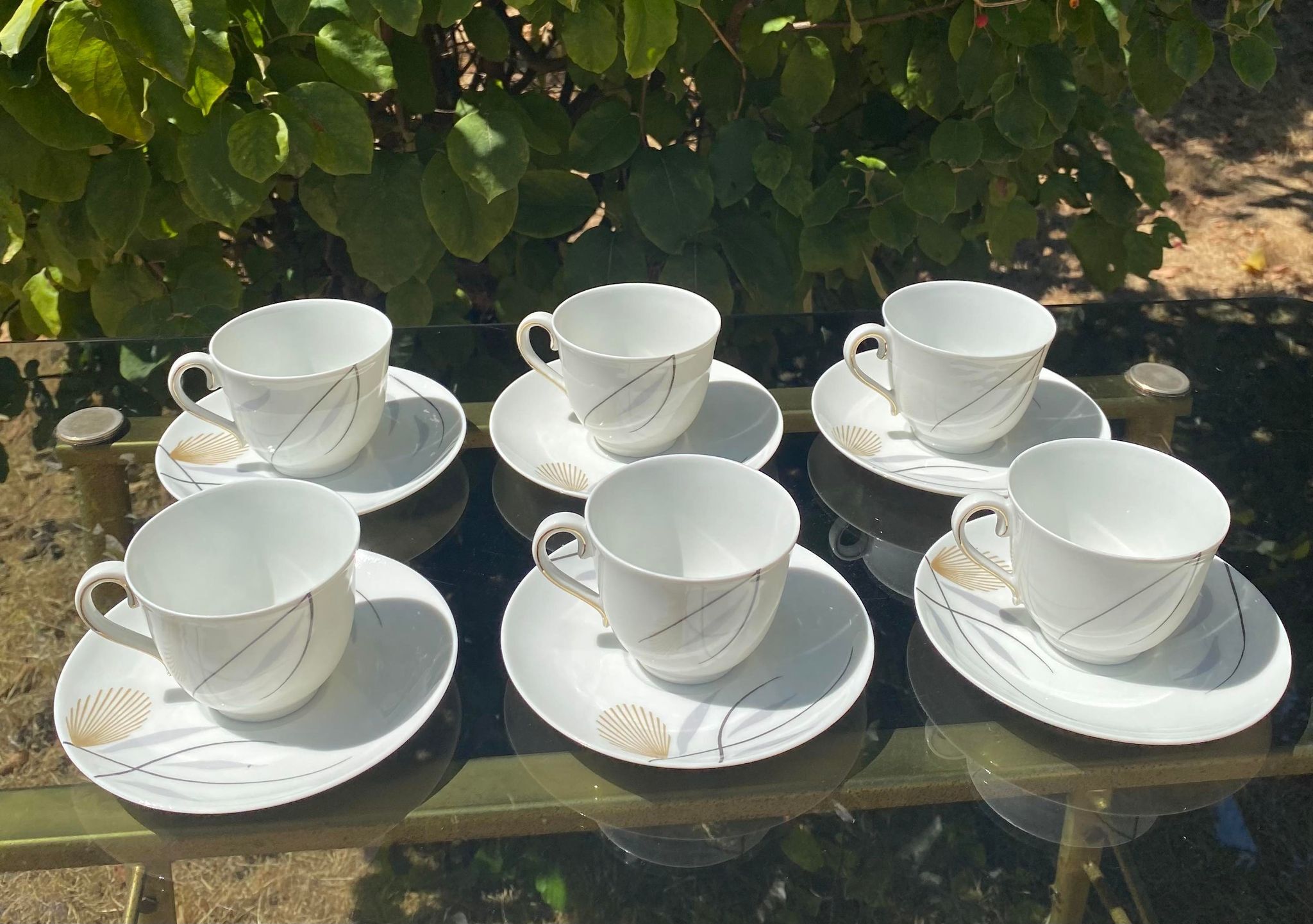 Porcelain coffee service by Charles Ahrenfeldt from Limoges France