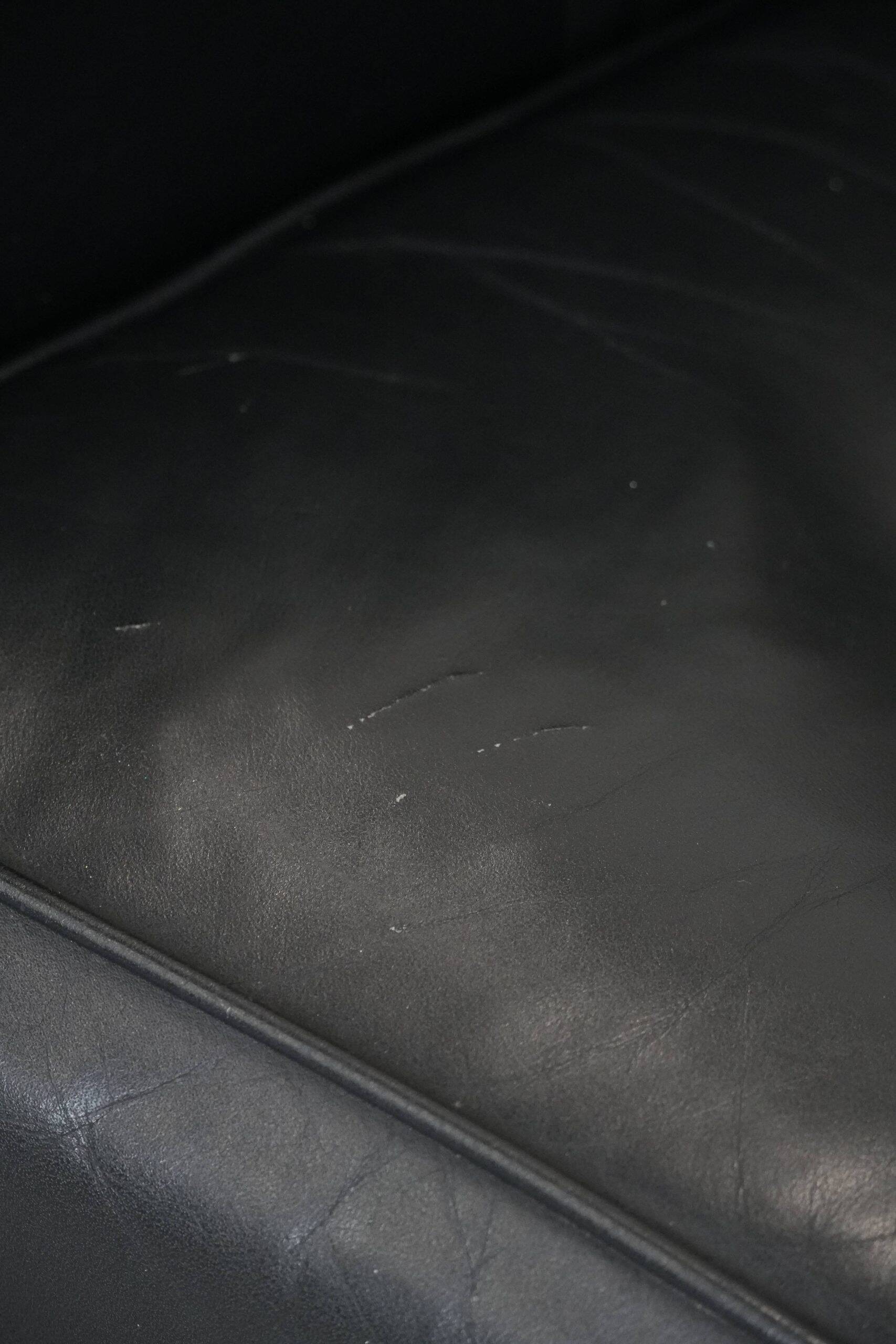 Set of  two black leather Art Deco design armchairs