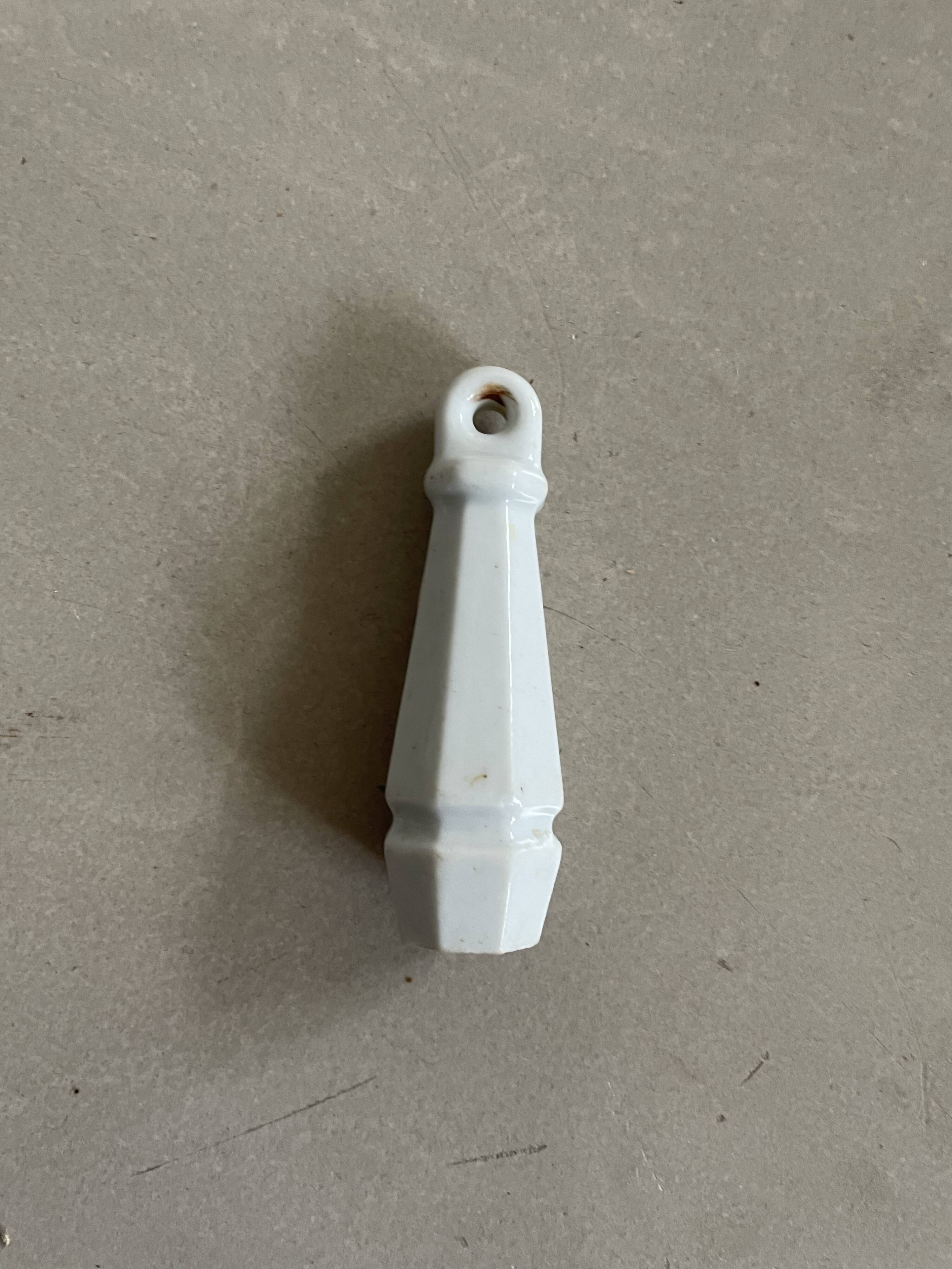 Ceramic flush handle